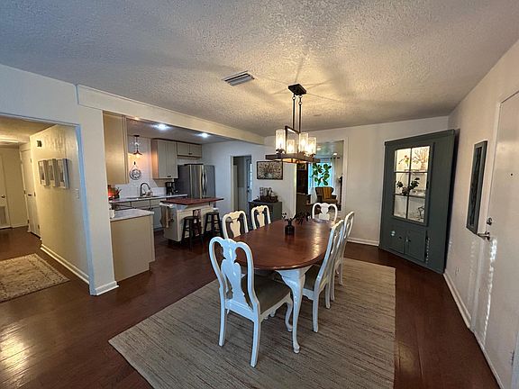 Open-concept kitchen / dining / living room