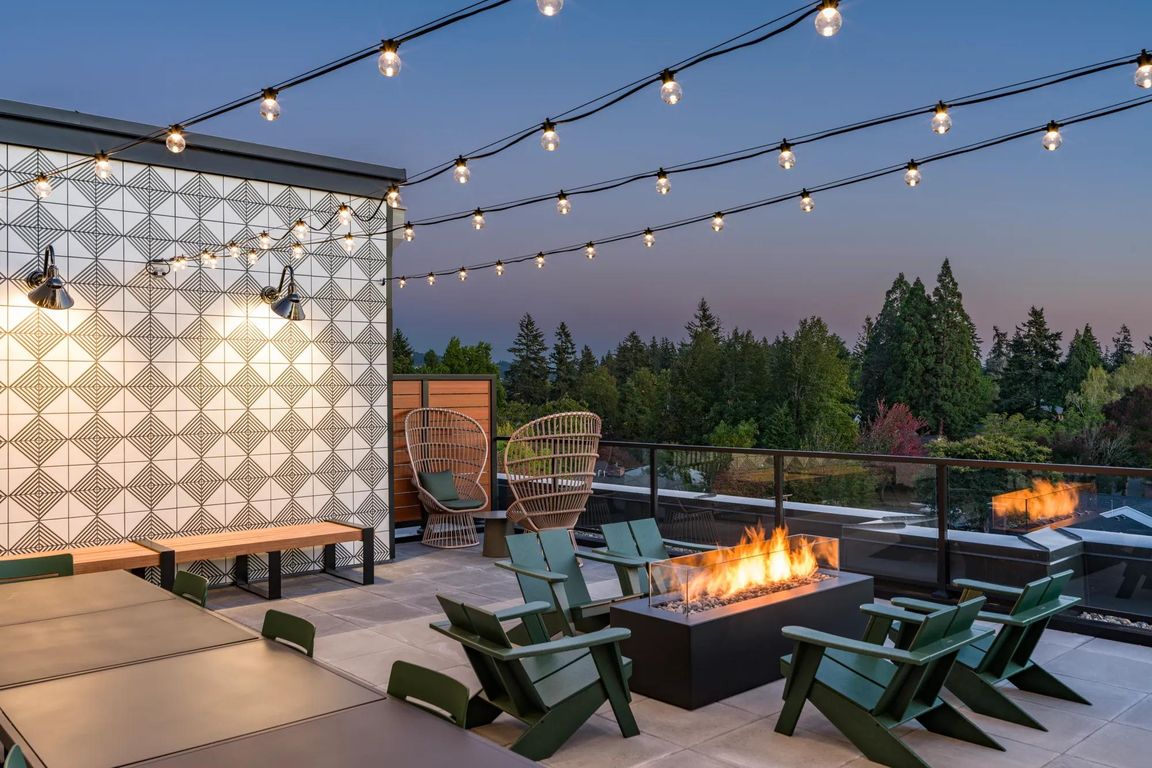 Cozy up at Modera Woodstock's outdoor terrace, complete with a welcoming firepit for year-round gatherings.