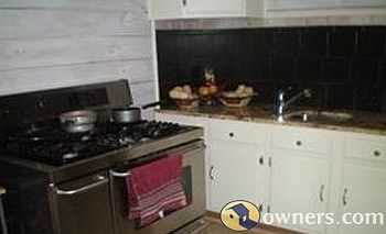 Whitewashed kitchen w/one sink area