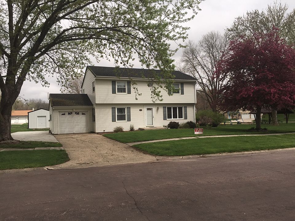 Front of house with new shed