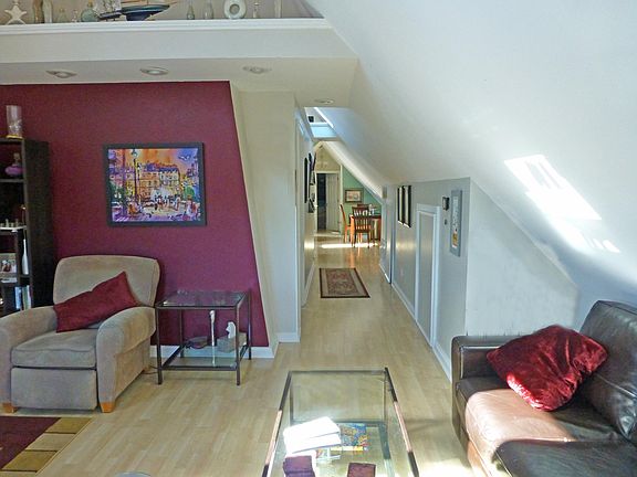 living room towards hallway. NOTE: Wall is no longer red.
