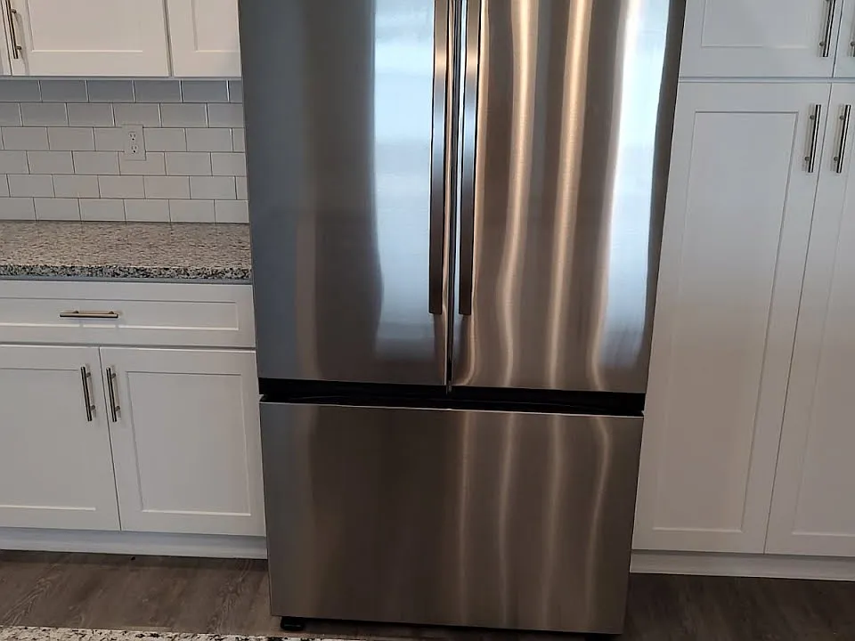 Kitchen with Brand New Stainless Appliances, brand new cabinets, and granite counters.