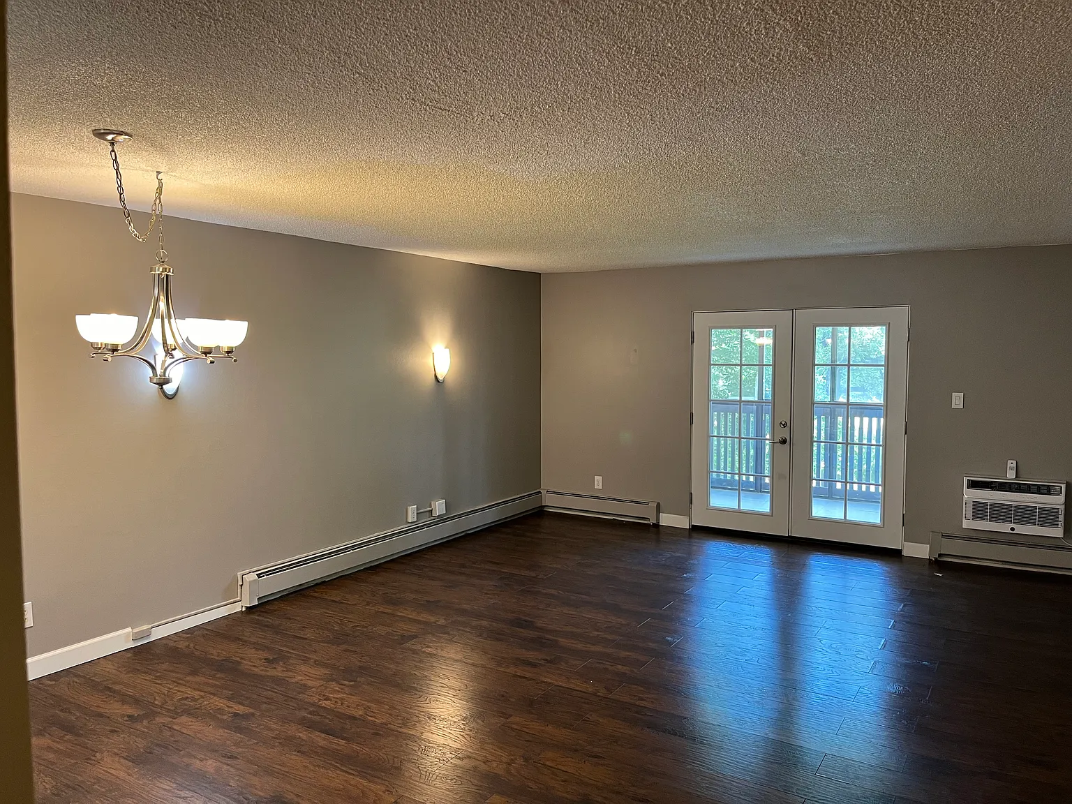 living room with french doors to lanai