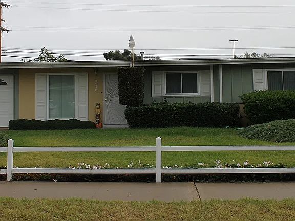 Front Yard with Living Room Window and Bedroom Windows