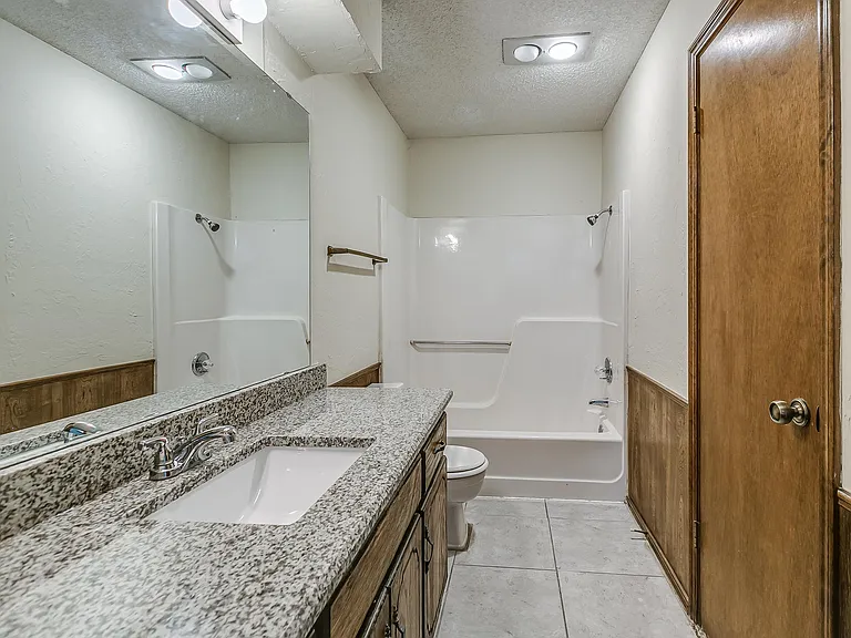 Jack and Jill bathroom , new granite countertop, new sink, new sink faucet