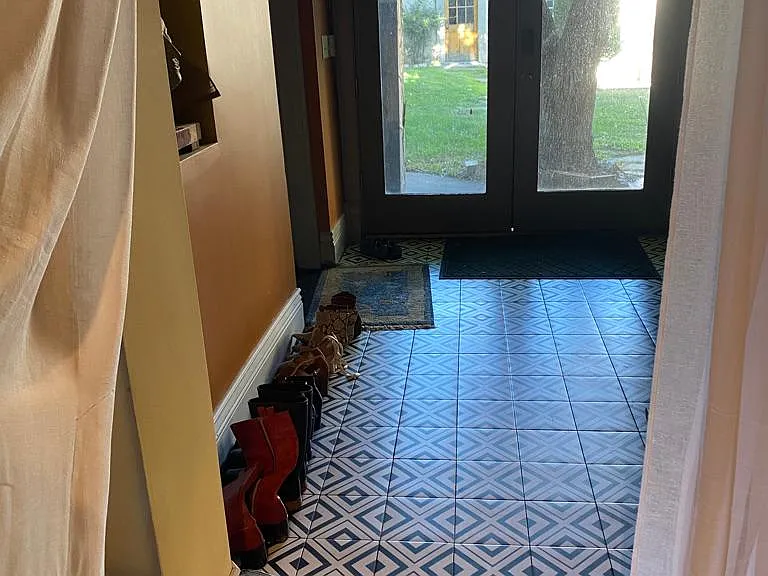 Hallway with access to backyard