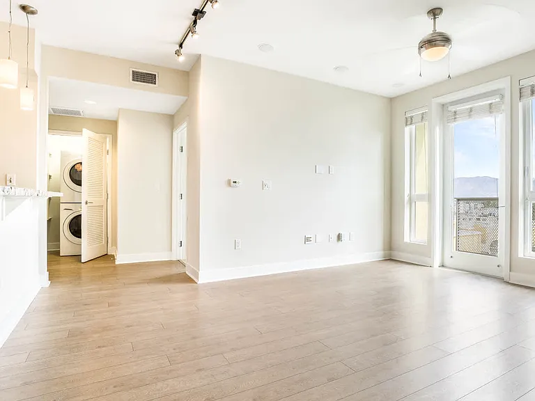 Living Room with Balcony and Hard Surface Flooring