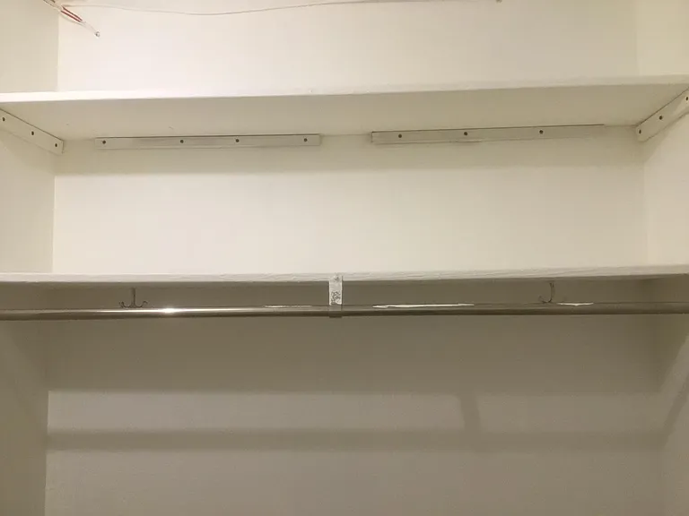 One of 2 very large closets.