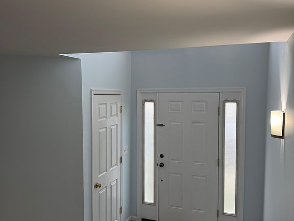 entry door and closet
