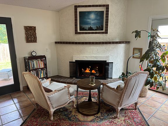My favorite place in the whole house. Nothing like sitting here in with morning coffee with feet up next to the fire.