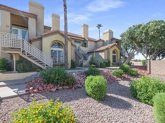 Private Entry to Unit Staircase on left to double French Door entry.