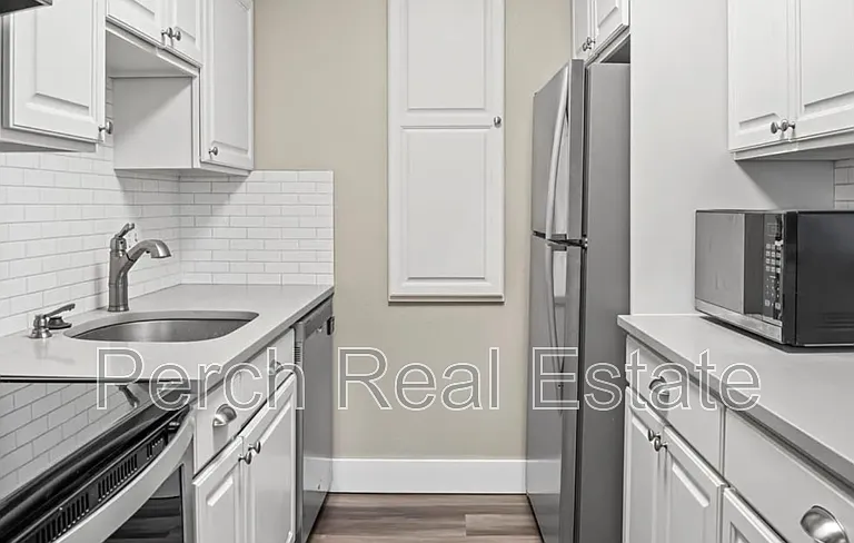 5770 E Warren Ave #207 — Photo 4