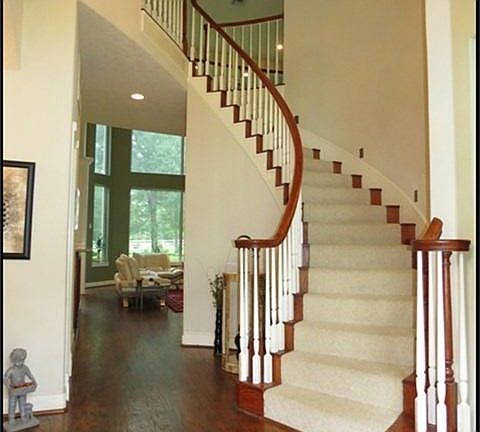  Spiral staircase with wood spindles.