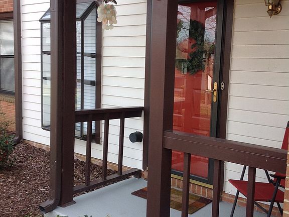 Sidewalk leads to covered po