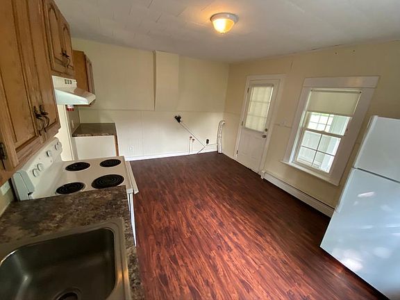 Kitchen and rear entrance to sunroom
