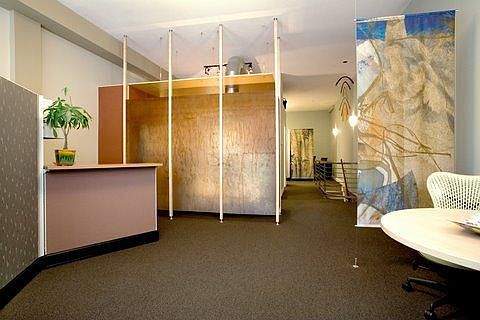 Upstairs, custom partition to "cover" the kitchen area.  