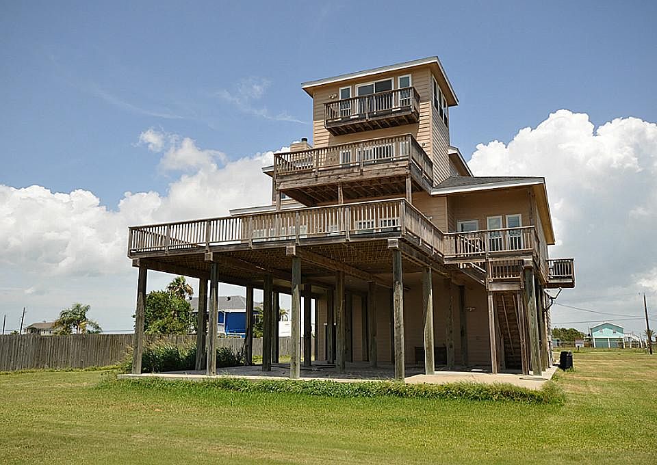 3 levels of decking and large covered patio under home perfect for enjoying the outdoors and views.