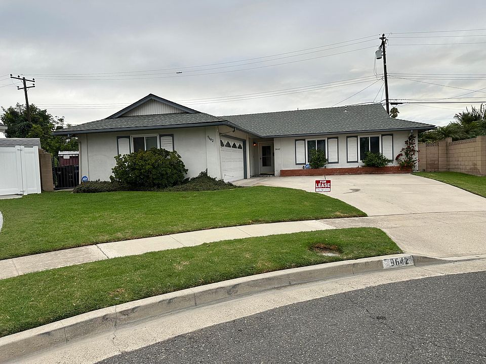 Great curb appeal. New windows. Sweeping driveway and 2-car garage. Does NOT back to street.