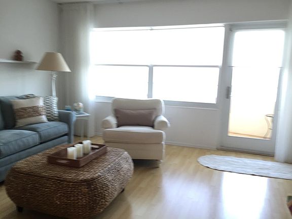 living room & patio view of gulf