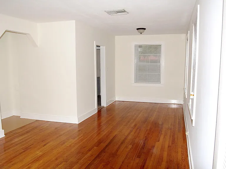 Beautiful Wood Floors. Spacious Living Room/Dining Room.