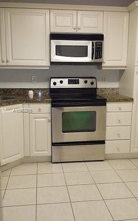 3rd image of 3600 Mystic Pointe Dr APT 617