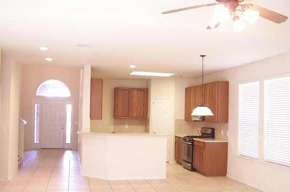  SPACIOUS OPEN KITCHEN WITH BREAKFAST BAR.