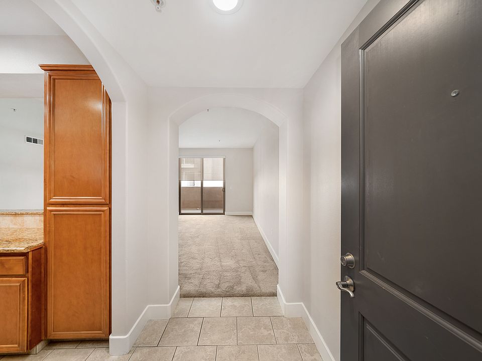 Semi-open kitchen front door entrance