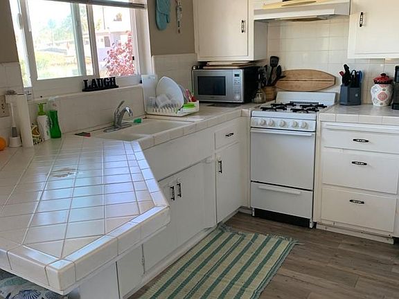 kitchen of apartment B. Refrigerator and storage is to the right out of the picture