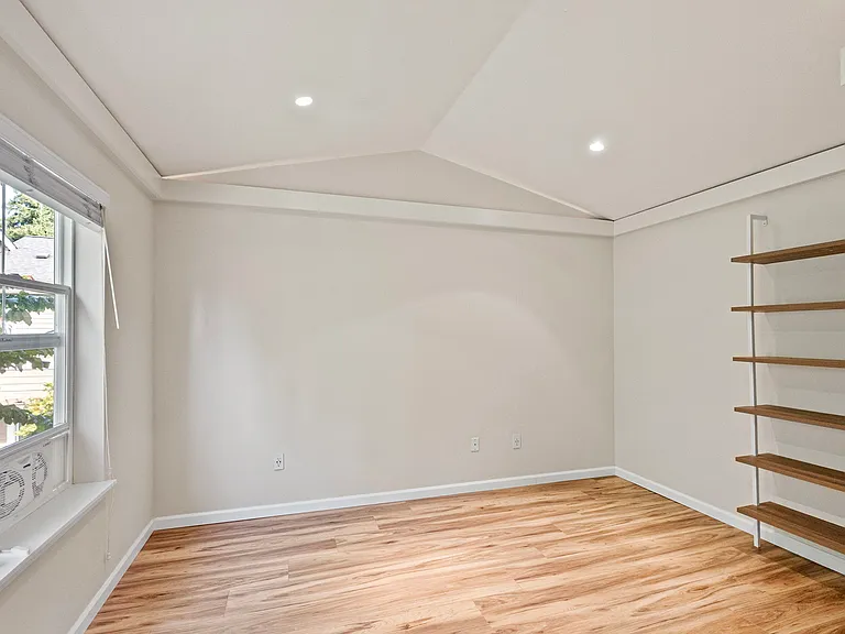 Vaulted ceilings in primary bedroom