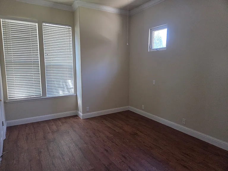 Bedroom on the other side of the shared bathroom