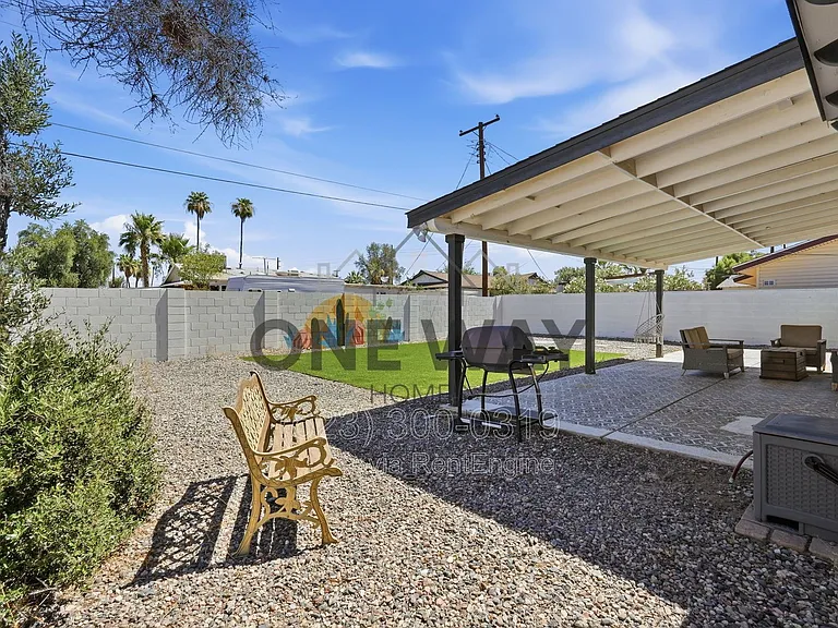 8702 E Sheridan St — Photo 25