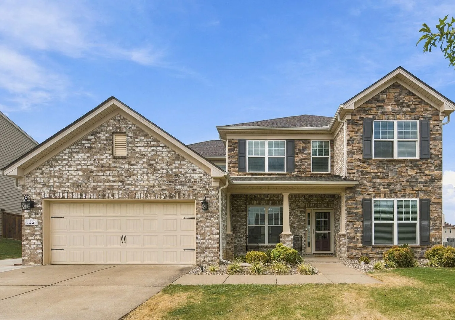 Spacious 5-Bedroom Home with Exceptional Storage, Updated Finishes & Entertaining Space — Photo 1