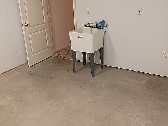 Scrub sink in storage/craft/room