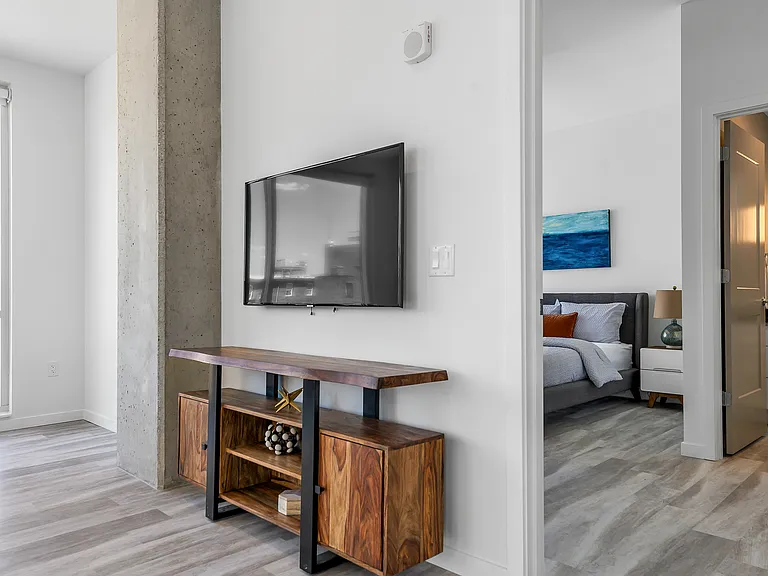 open layout of living room and bedroom at The Blonde