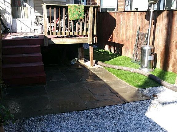 Back Yard with off street parking spot