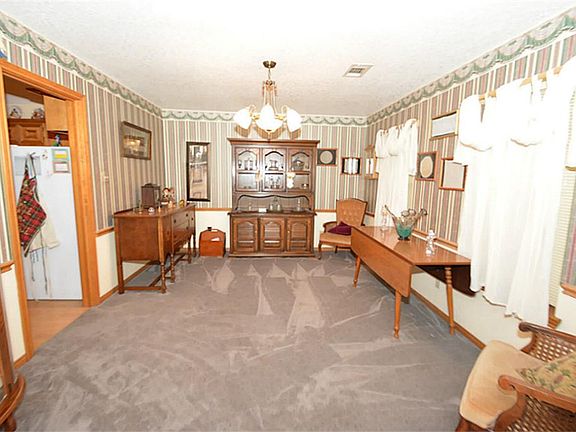 FORMAL DINING ROOM OR CAN BE USED FOR AN OFFICE AREA FOR WORK FROM HOME PEOPLE THAT DON'T WANT FORMA