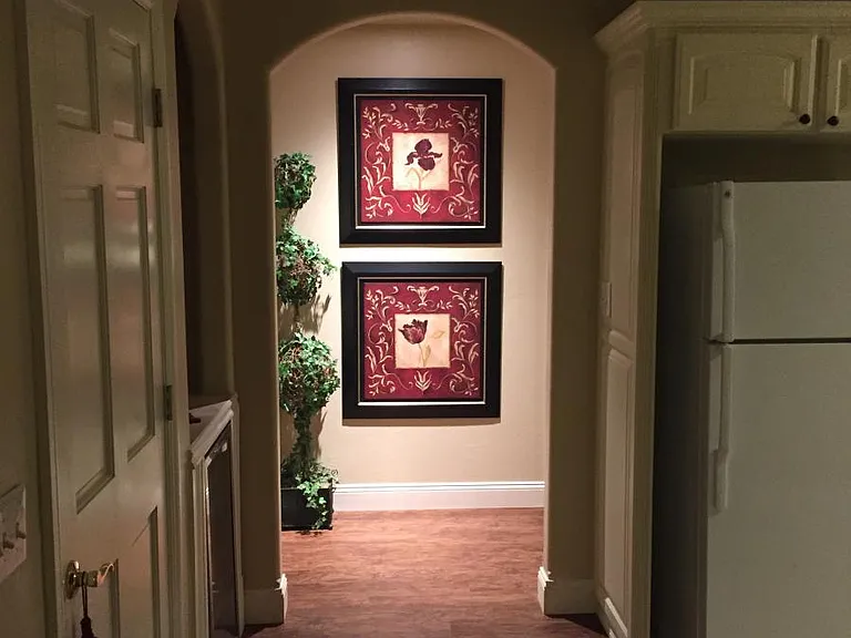 Kitchen hallway leading to 3rd bedroom and laundry room.