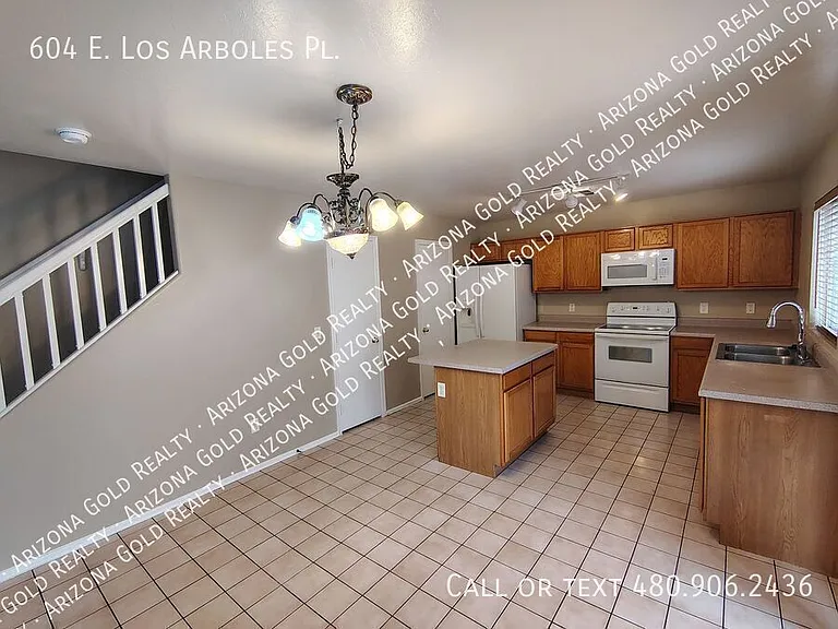 604 E Los Arboles Pl — Photo 10