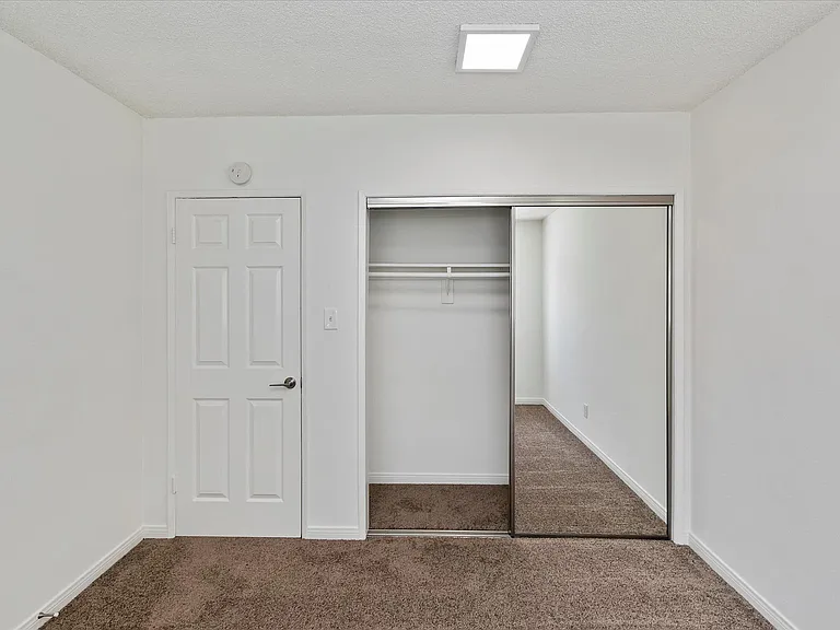 bedroom #2 mirror closet doors