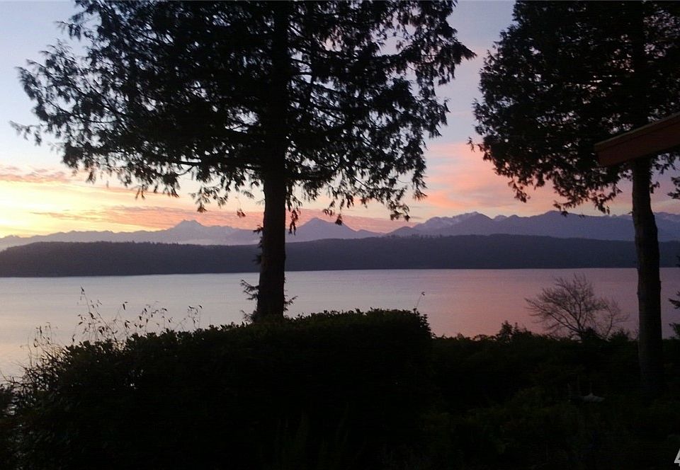 Stunning westerly views of Oly Mtns and Hood Canal from this 242' waterfront sanctuary.  Watch eagles soar, collect marine life and eat oysters from your beach on this 6.42 acre property with mature trees. SW view to the left looks down the Canal towards Seabeck.  To the right looks North and up Toandos peninsula.