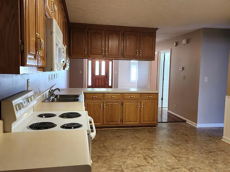 Kitchen viewed from Laundry Room