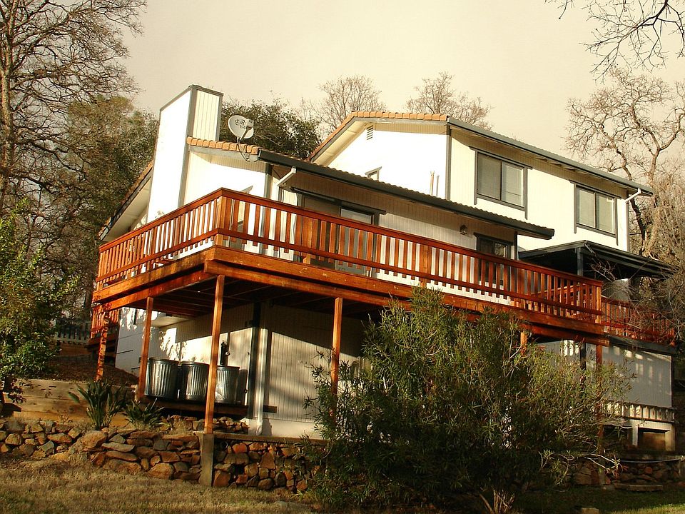 VIEW OF THE HOUSE FROM BACKYARD
