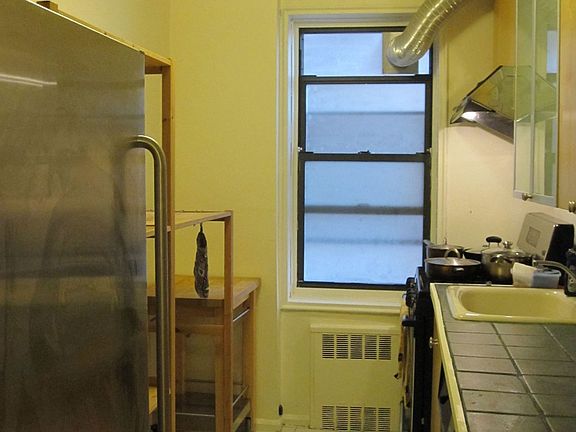 4th image of 102-12 65th Ave APT D38