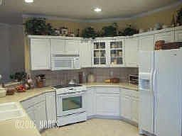 kitchen now painted olive green - designer look with the living areas!