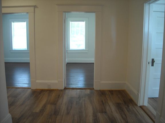 ENTRANCE HALLWAY: RIGHT KITCHEN DOOR, CENTER LIVING ROOM DOOR, LEFT MASTER BEDROOM DOOR