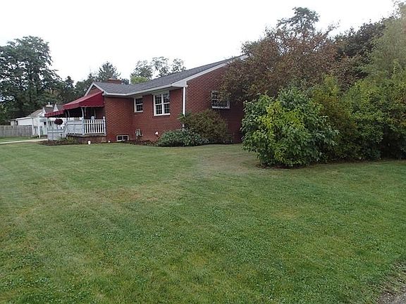 Nice corner lot for this all brick ranch!