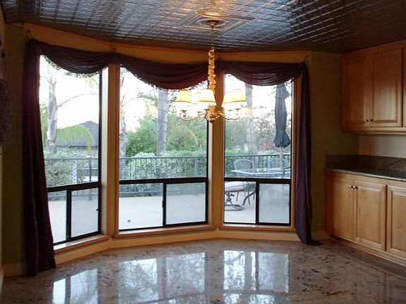Formal dining room has fireplace
