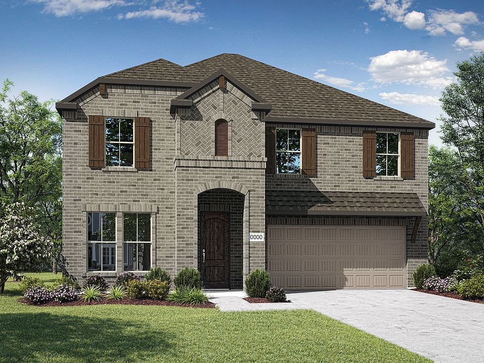 Elevation C is a two story full brick home design with arched entry, and ceder shutters and corbels.