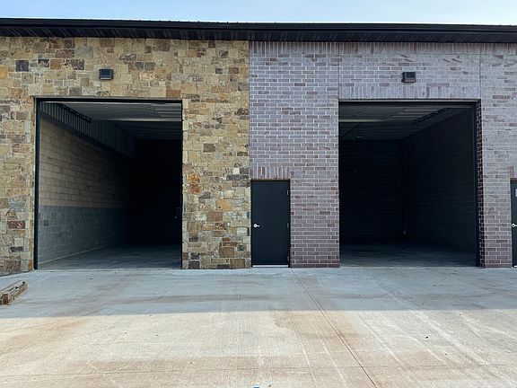 Units 4/3 - 2,500 SF (25'x50') 
- Heated with electric 
- Two 12'x14' overhead garage doors 
- Lease Rate: $1,600/month