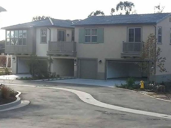 Our house is the entire top level. Our garage is the one-car in the center. The tree have grown since I took this photo.